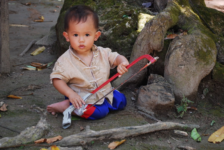 portrait of a little armed man