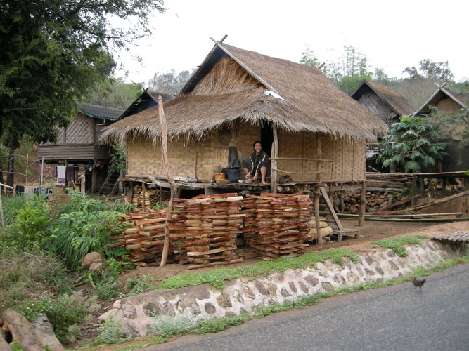 village house, a smile and a chicken